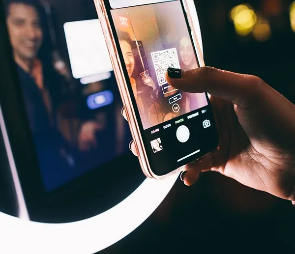 Guest-facing photo booth interface on iPad showing a clean, intuitive capture screen